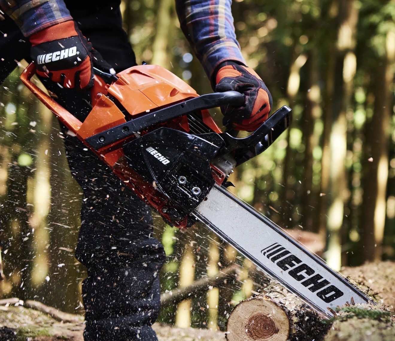 ECHO chainsaw cutting timber outdoors