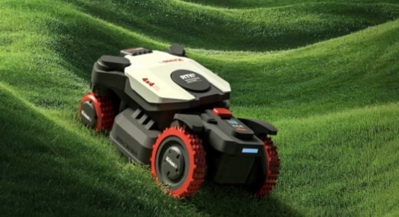 Kress robotic mower cutting a striped lawn